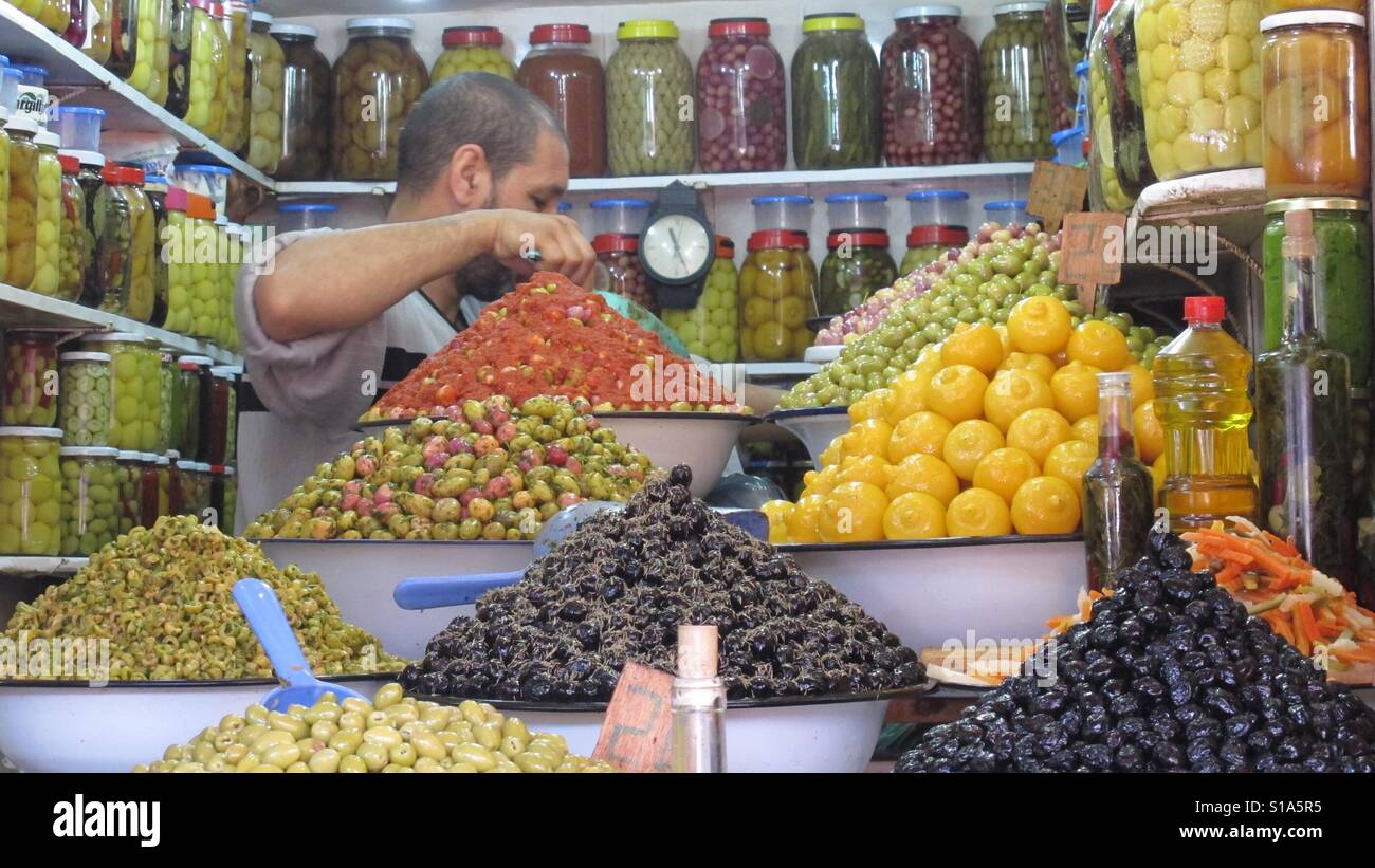 Buying olives - Smartphone Captured Stock Image