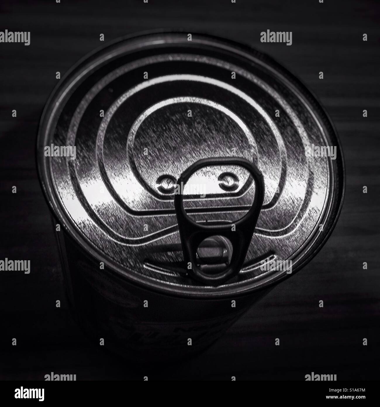 Faces in tin can object concept - Smartphone Captured Stock Image