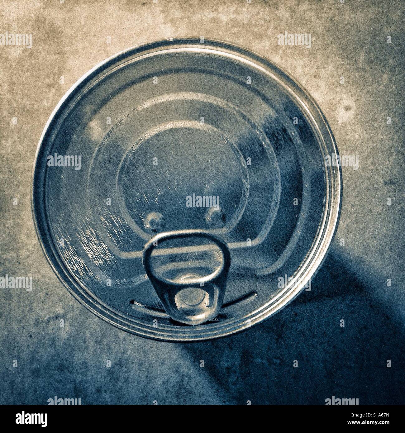 Face in tin can object concept - Smartphone Captured Stock Image