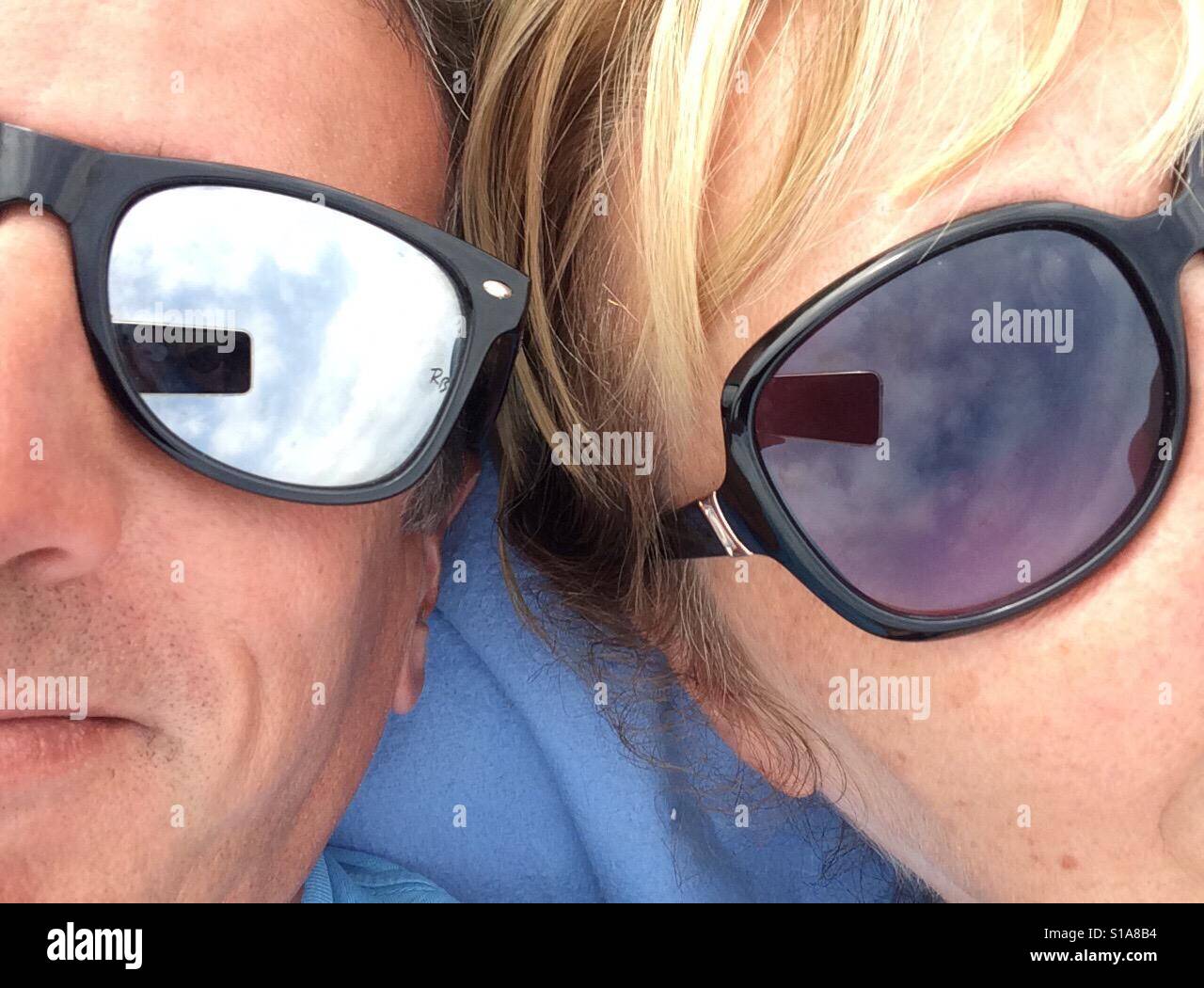 Sunglasses selfie for two please - Smartphone Captured Stock Image