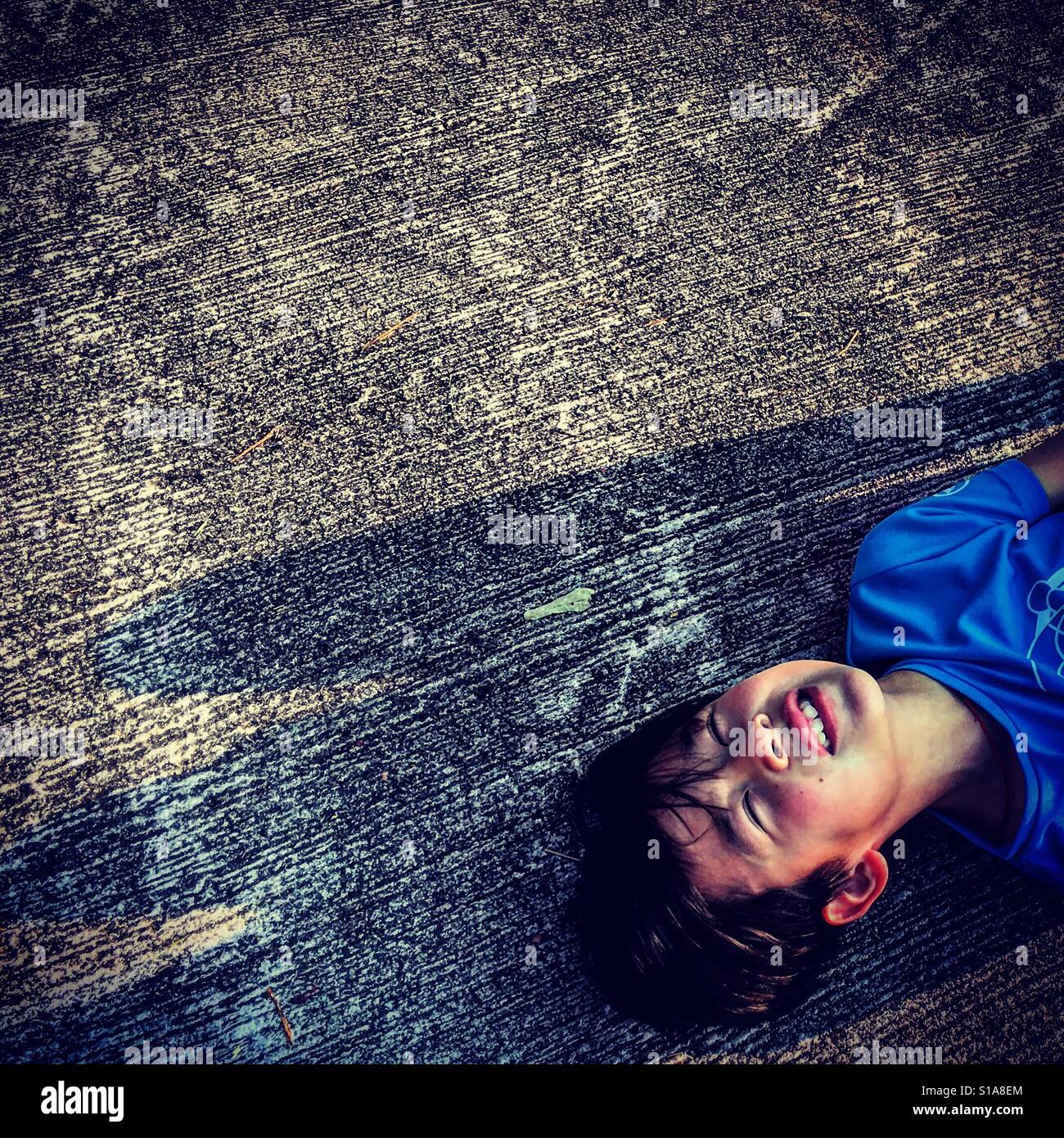 Crying kid after falling - Smartphone Captured Stock Image