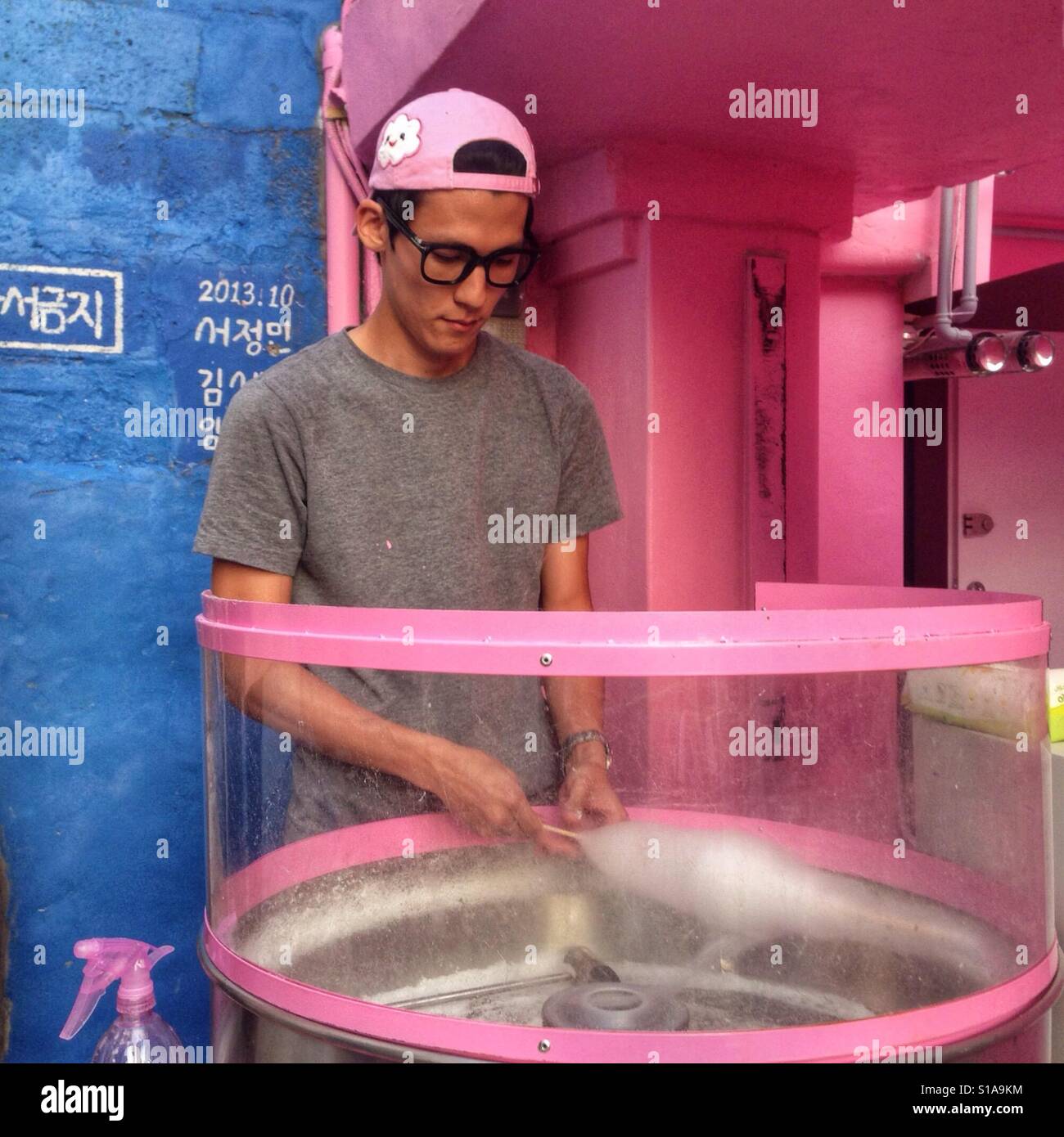 South Korea Man Making Pink Cotton Candy Stock Photo