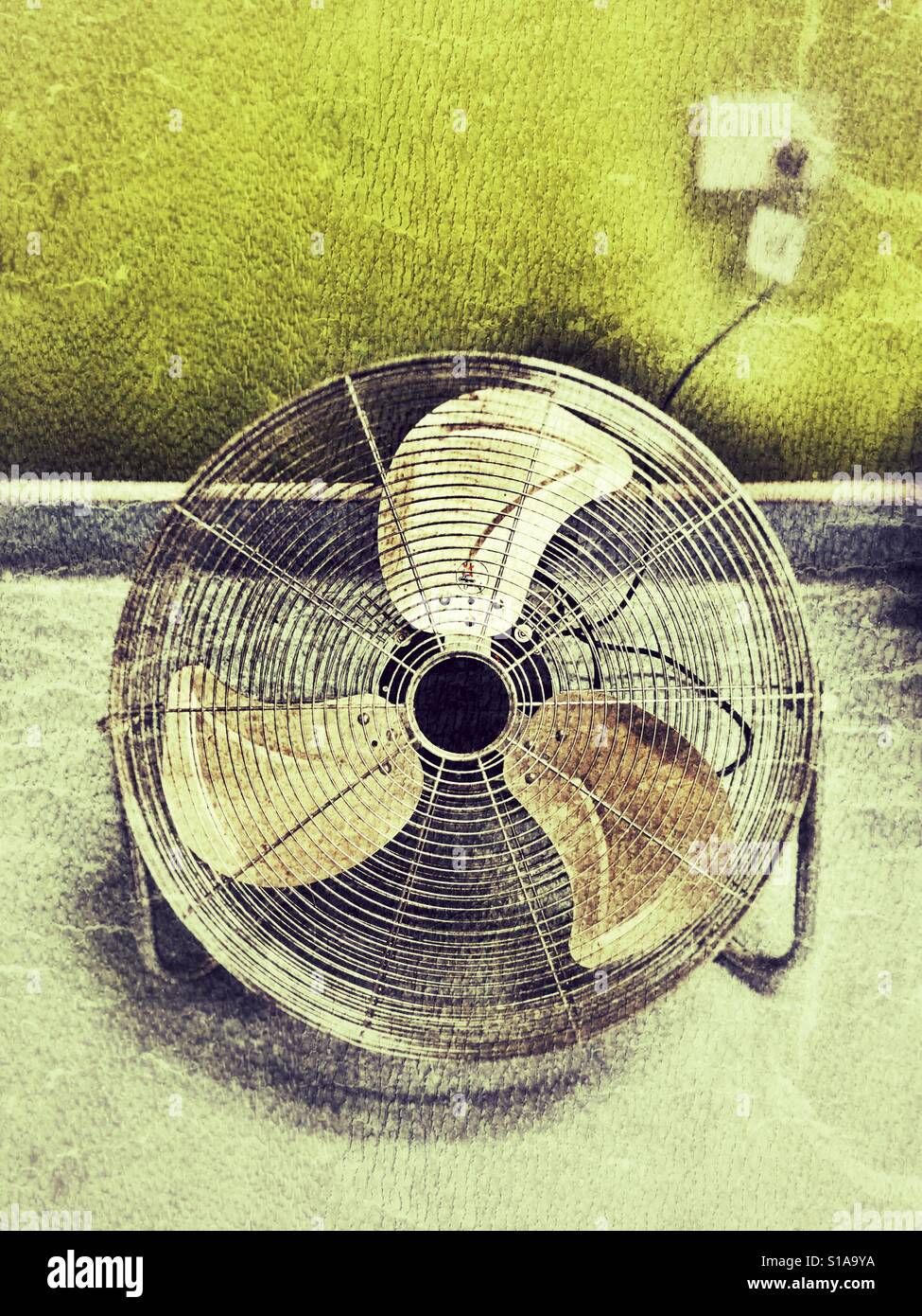 Electric fan on the floor. - Smartphone Captured Stock Image