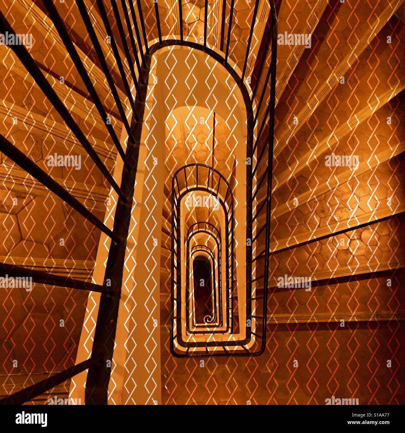 Staircase in a snail shell pattern Stock Photo