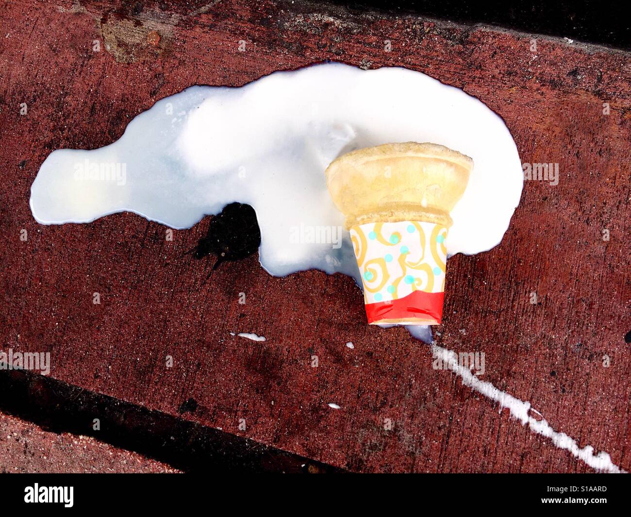 Spilled ice cream cone Stock Photo - Alamy