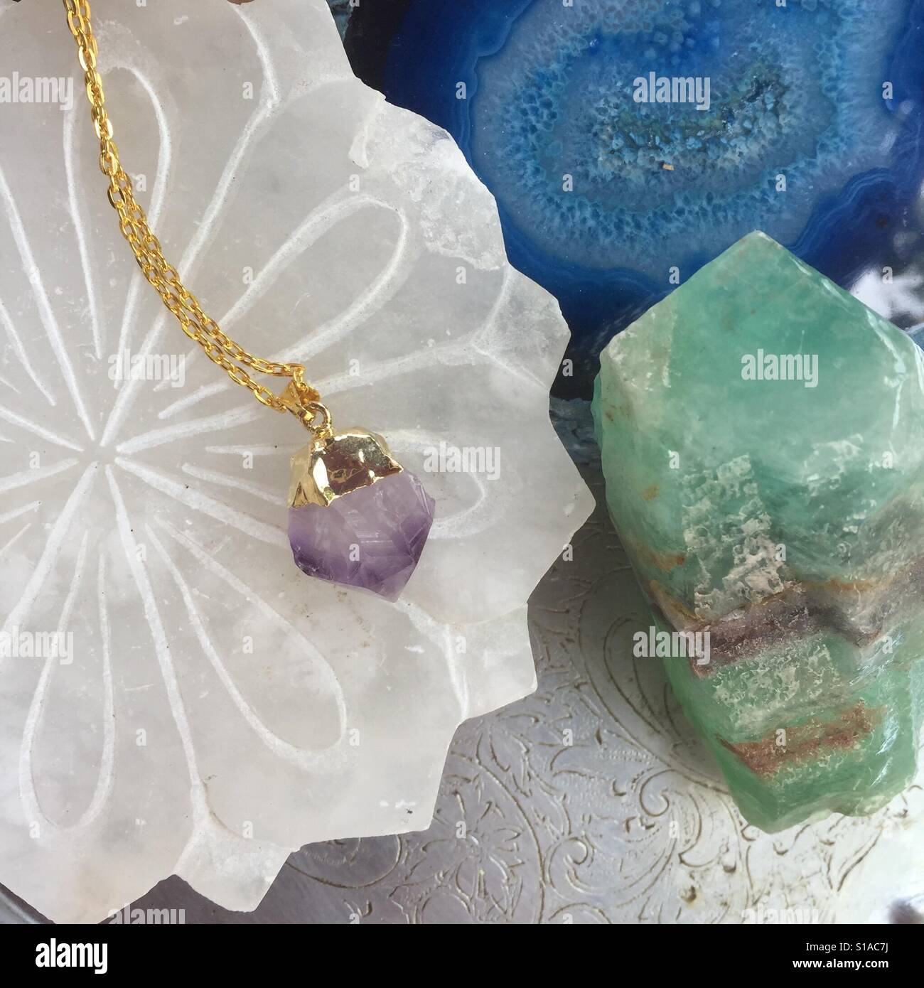 Amethyst crystal necklace Stock Photo