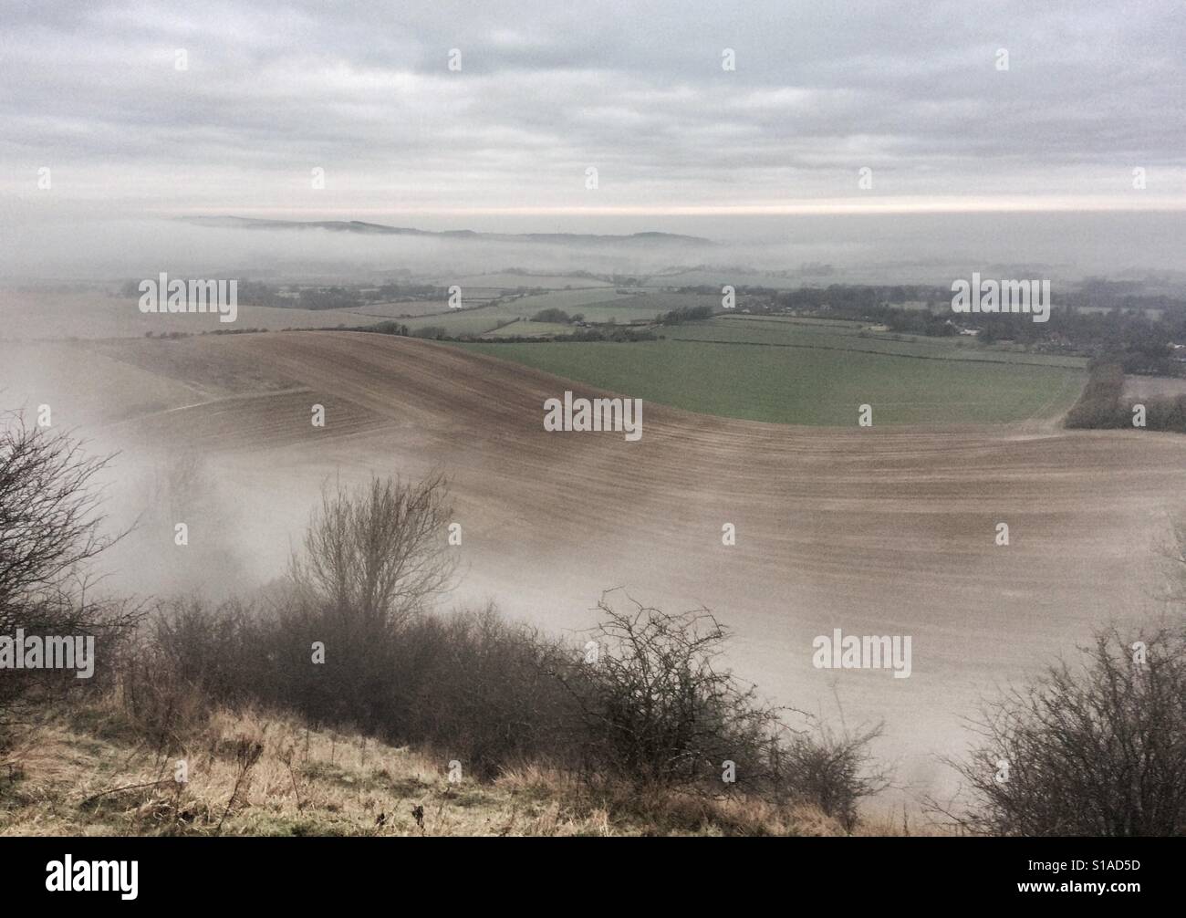 South Downs near Lewes, East Sussex on a misty winter morning. Stock Photo