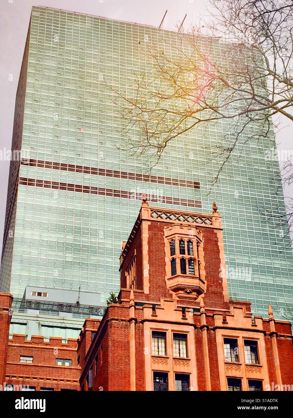 The UN Plaza Hotel behind tutor city, NYC, USA - Smartphone Captured Stock Image