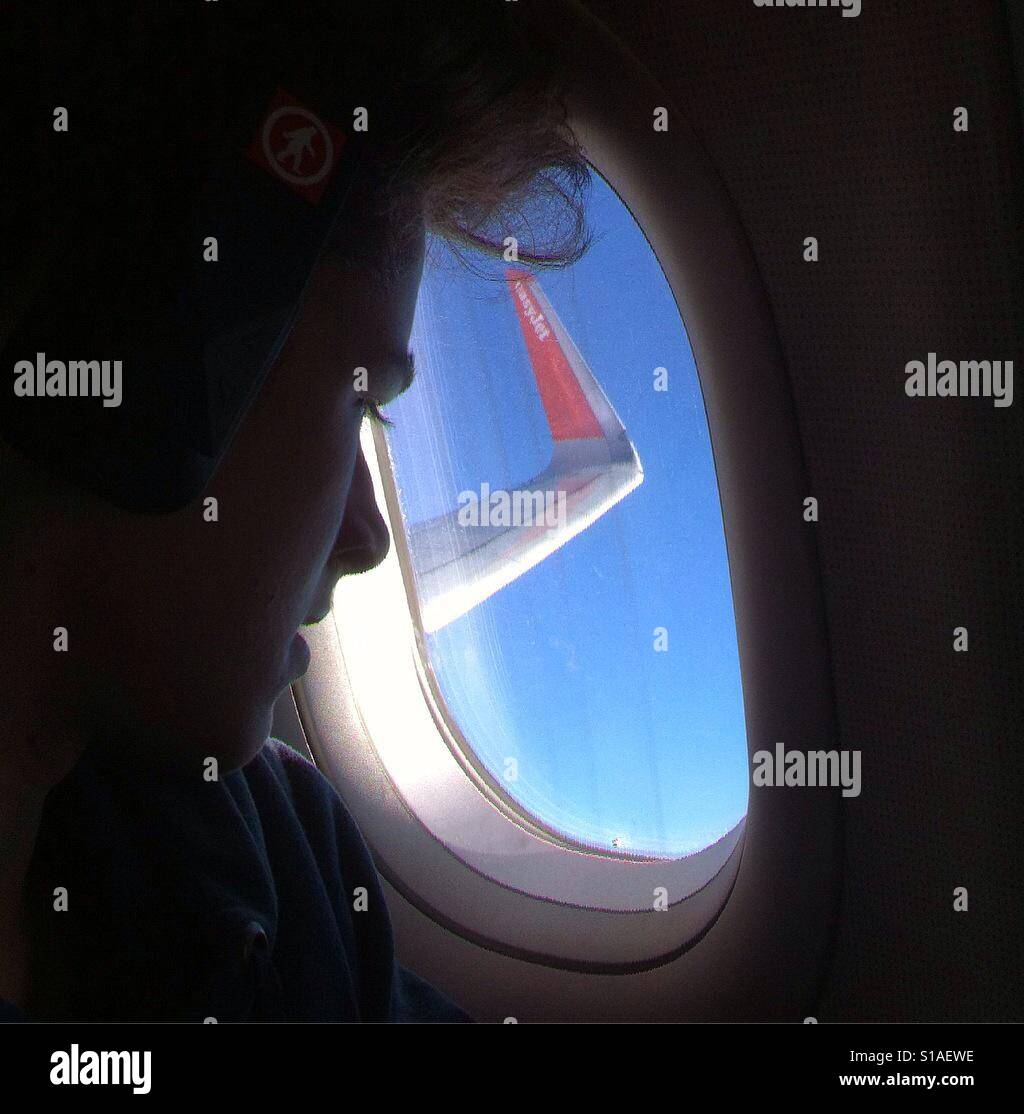 Looking out of a jet plane window Stock Photo
