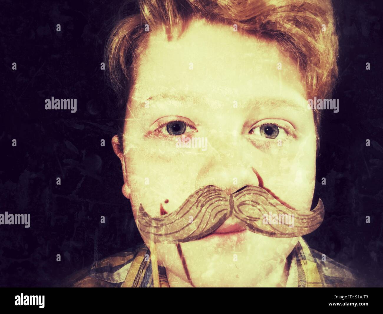 Boy with comedy moustache - Smartphone Captured Stock Image