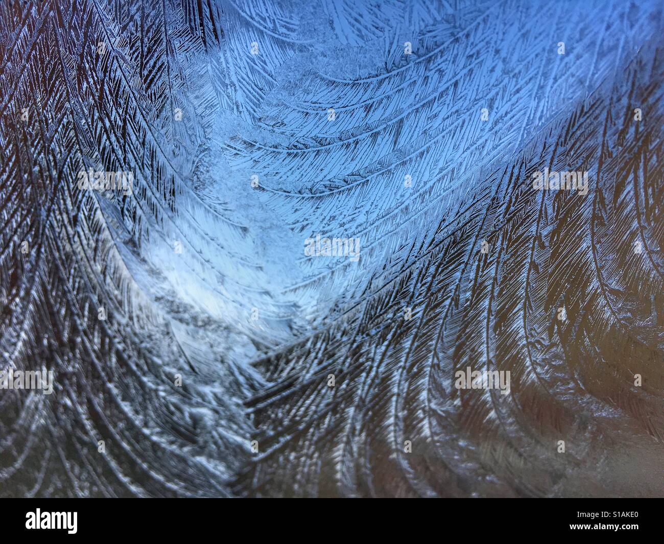 Frost on car windscreen, from inside looking out Stock Photo Alamy