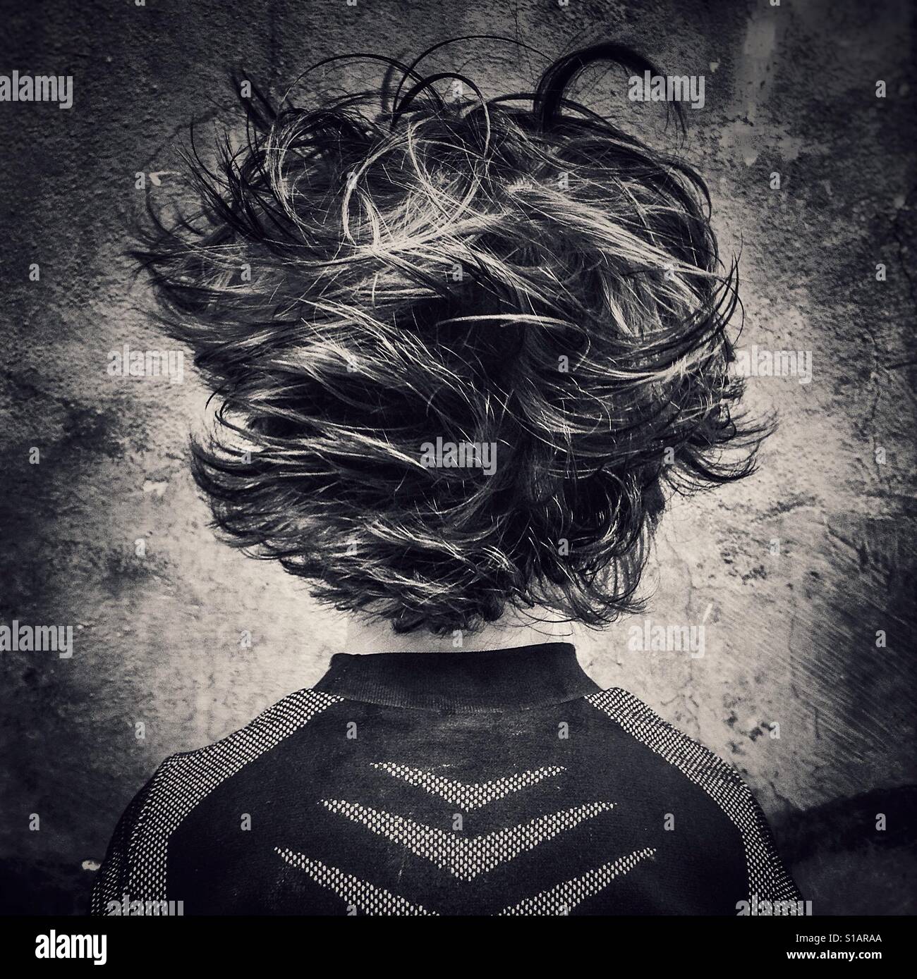 Back of kid's head on black and white - Smartphone Captured Stock Image