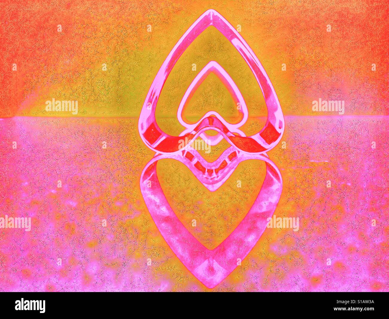 Hearts and reflections in pinks. Plastic hearts reflected in polished granite with added effects. - Smartphone Captured Stock Image