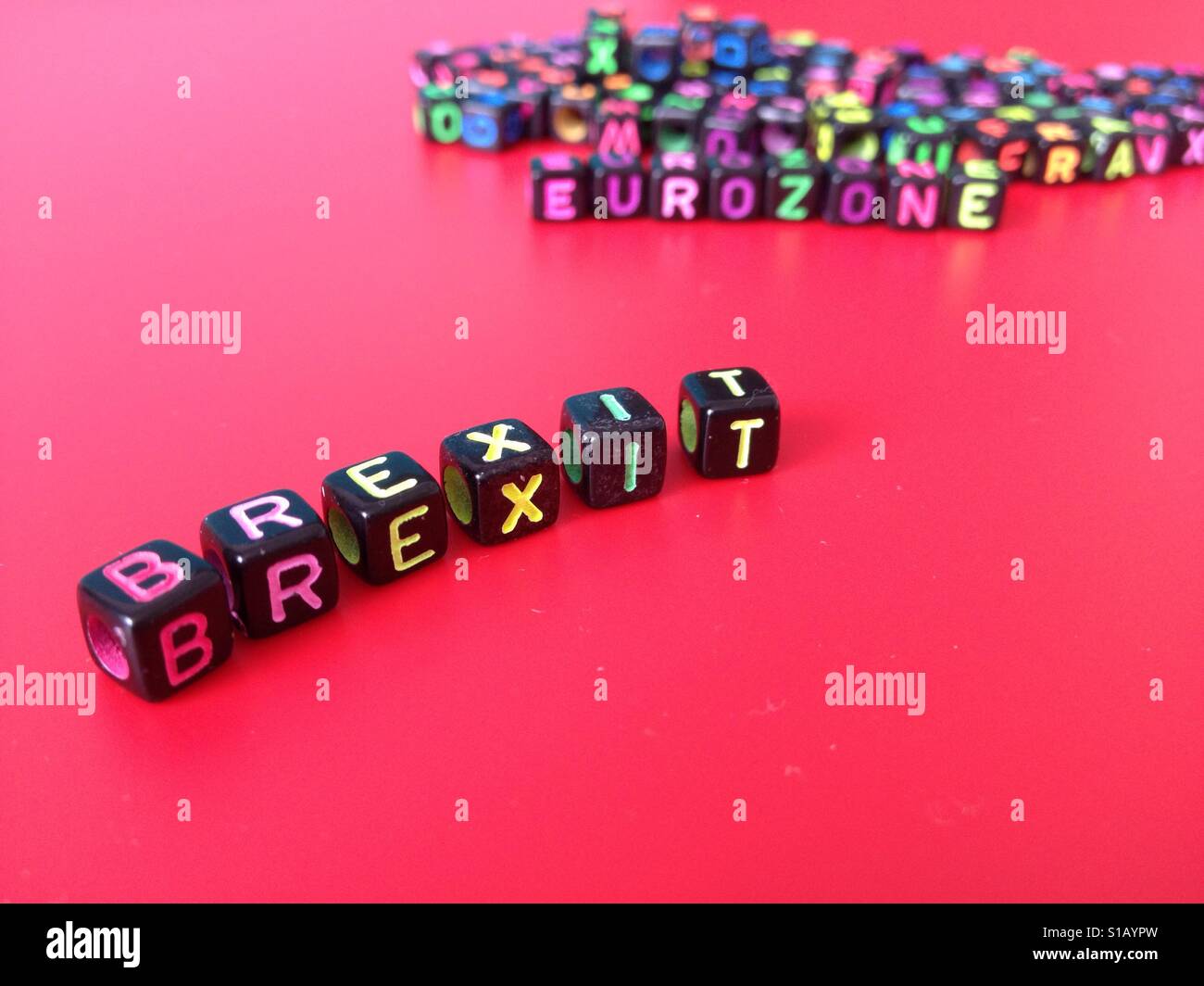 The word brexit with on the background the word eurozone Stock Photo
