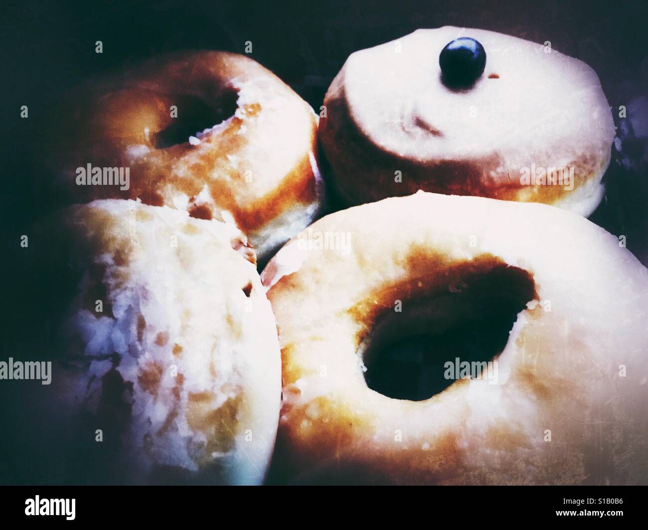 Close up of assortment of doughnuts. - Smartphone Captured Stock Image