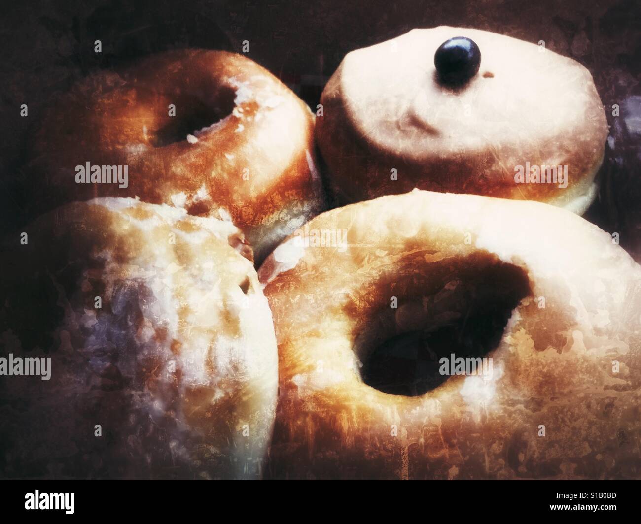 Close up of an assortment of sugary doughnuts. - Smartphone Captured Stock Image