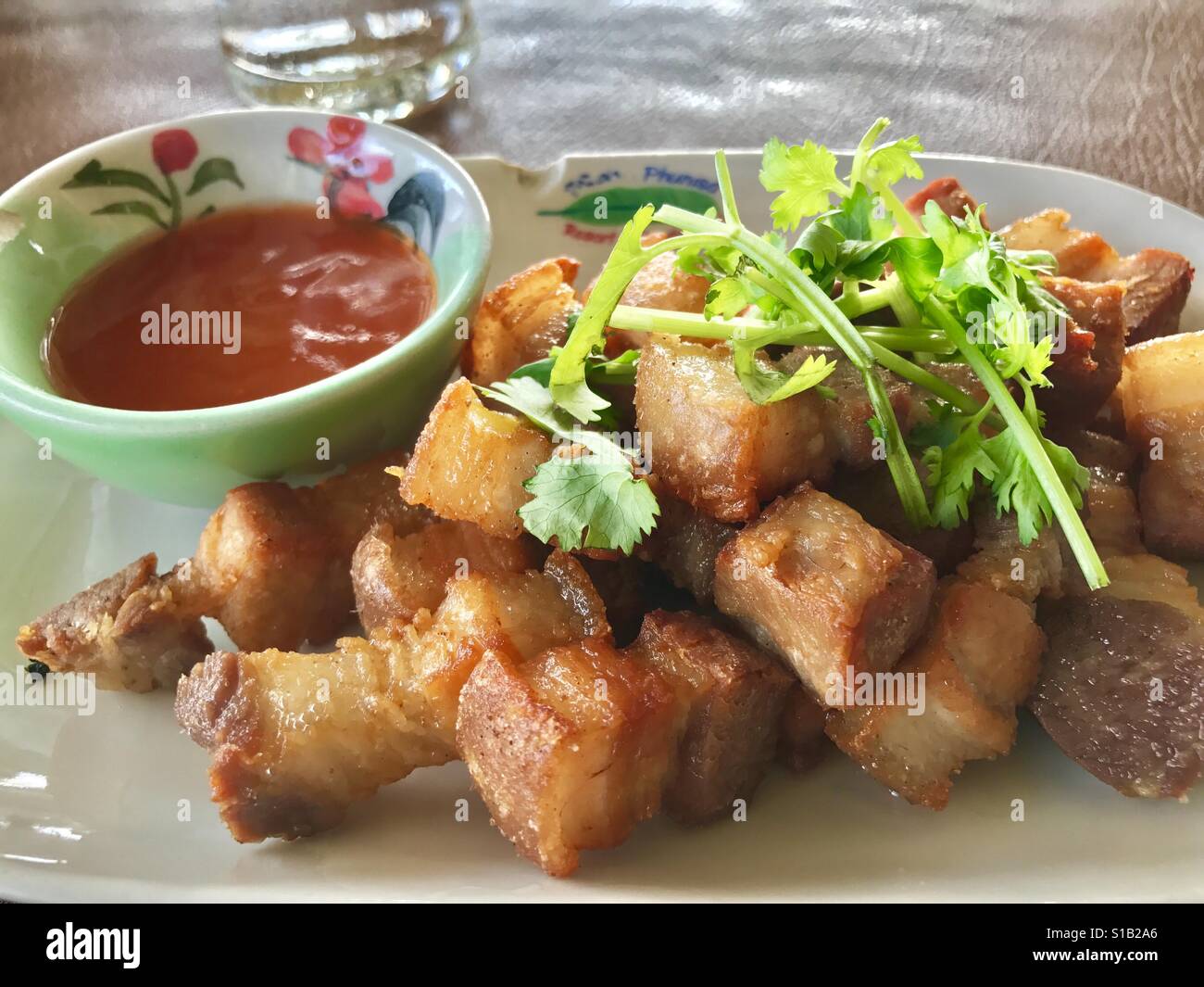 Deep fried streaky pork with ketchup Stock Photo