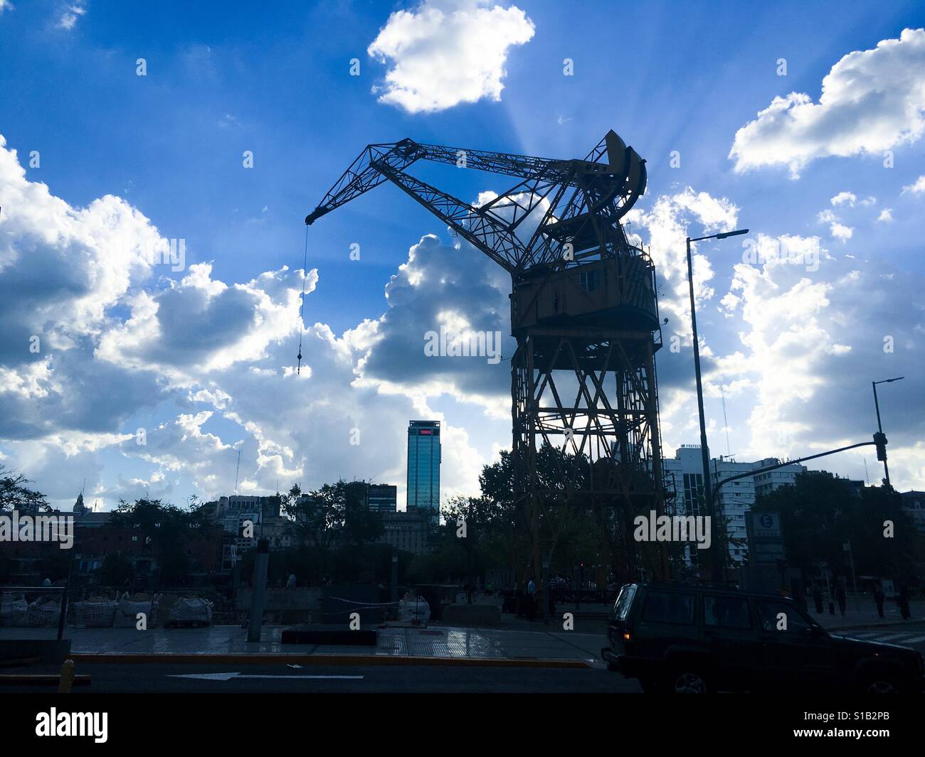 Crane in the square of Puerto Madero, Buenos Aires - Smartphone Captured Stock Image