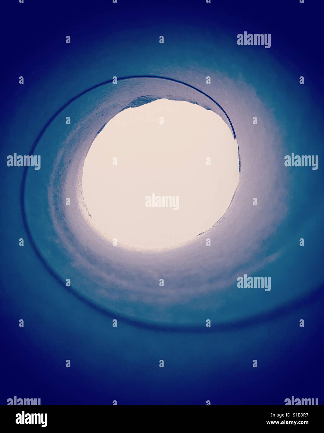 An abstract of the inside a toilet paper roll - Smartphone Captured Stock Image