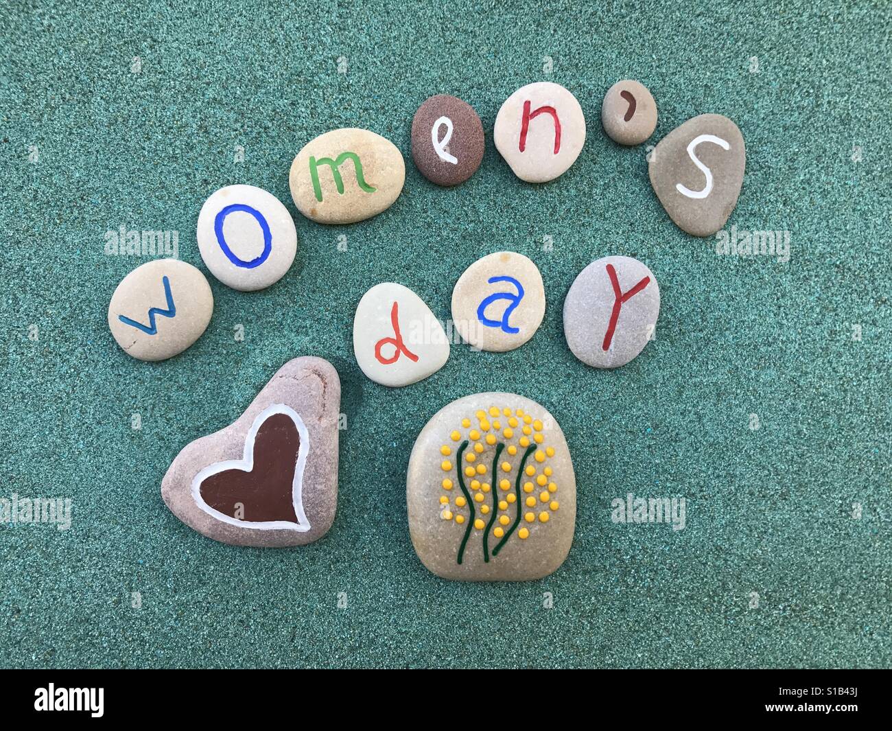 8 March, Women's Day, conceptual stones composition Stock Photo