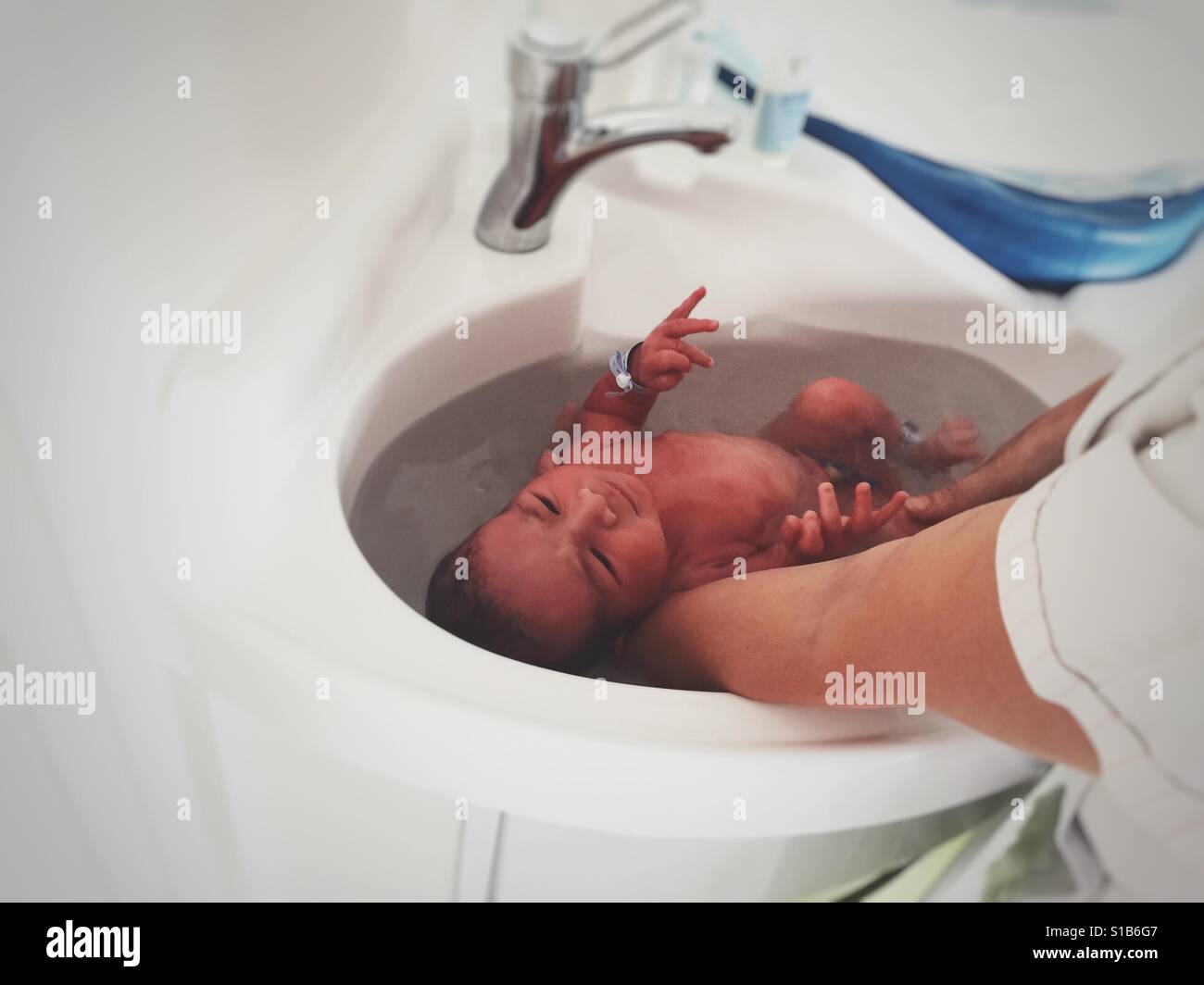 Newborn baby bath hospital - Smartphone Captured Stock Image