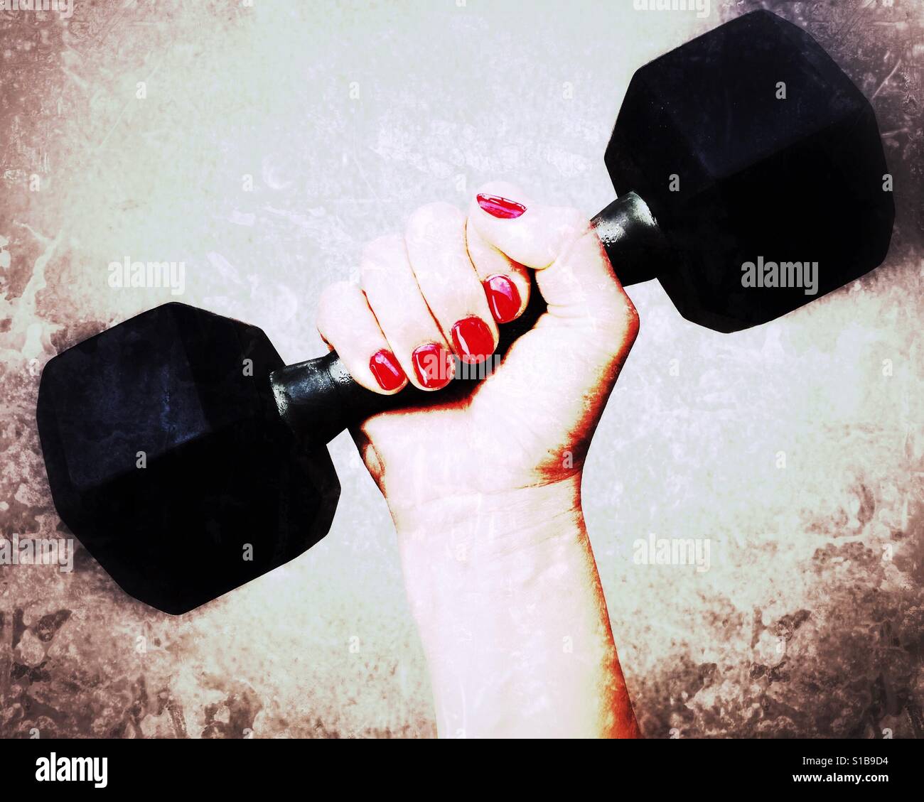 Close up of a woman's hand holding onto a dumbbell weight. Bright edit. - Smartphone Captured Stock Image