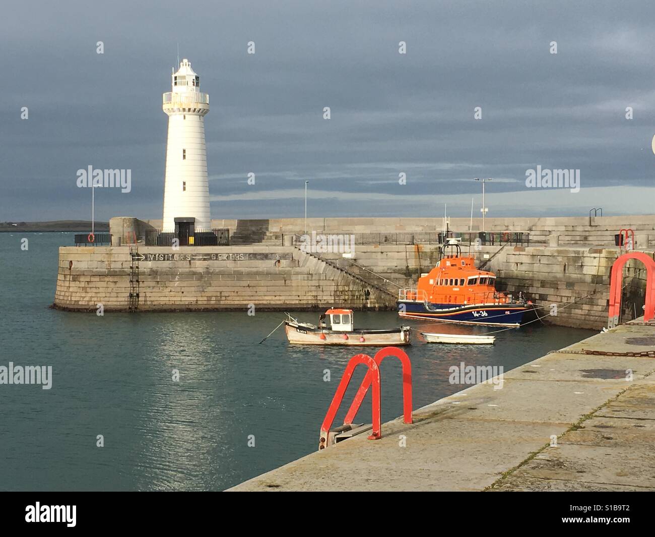 Donaghadee lighthouse with RNLI lifeboat Stock Photo