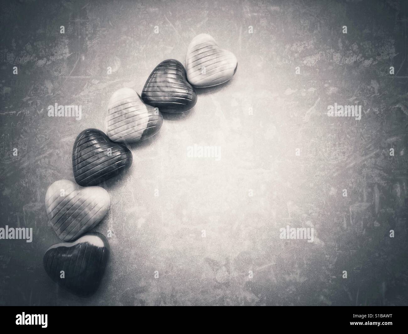 Black and white chocolate candies background - Smartphone Captured Stock Image