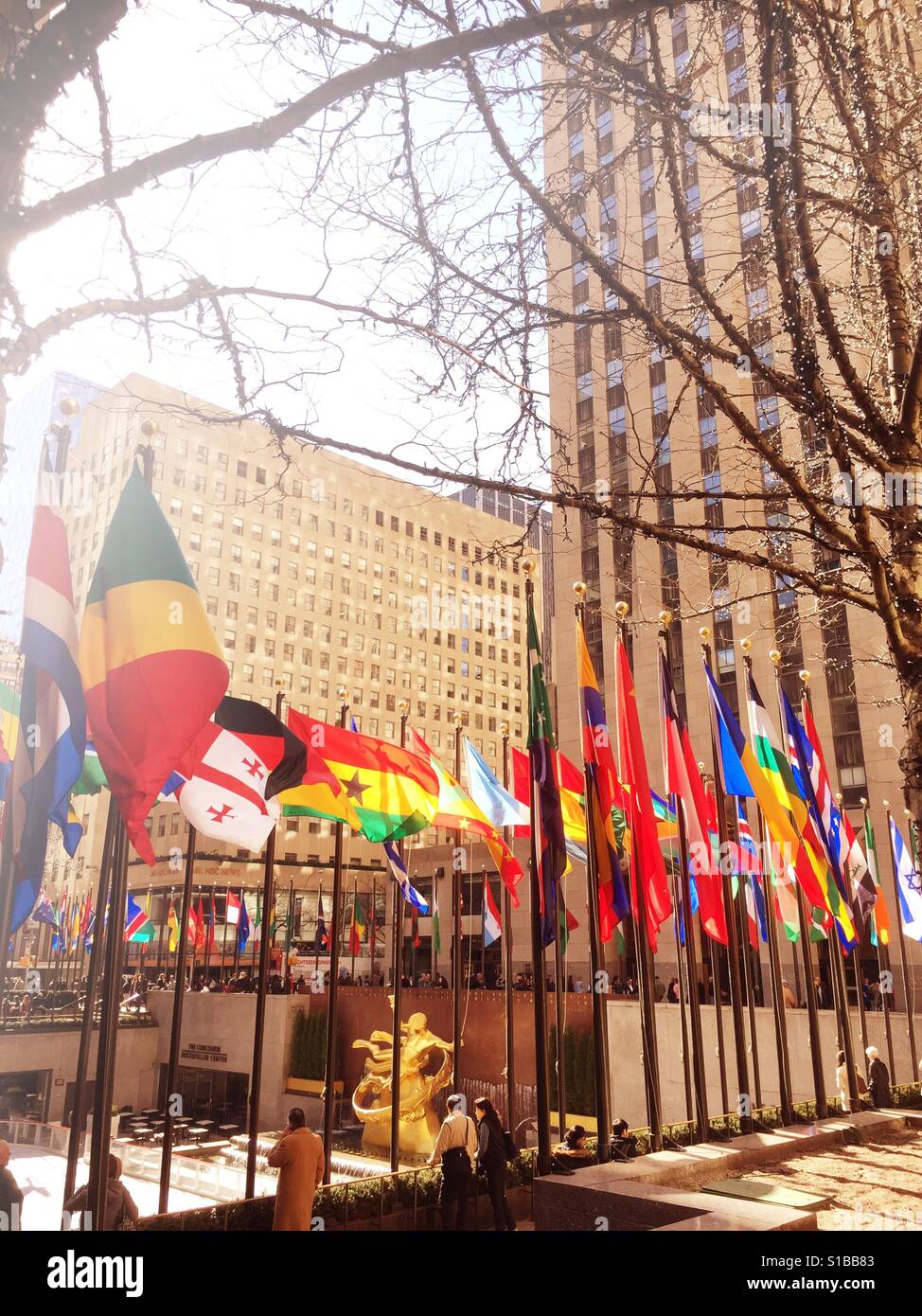 International nation flags at Rockefeller center plaza, NYC, USA - Smartphone Captured Stock Image