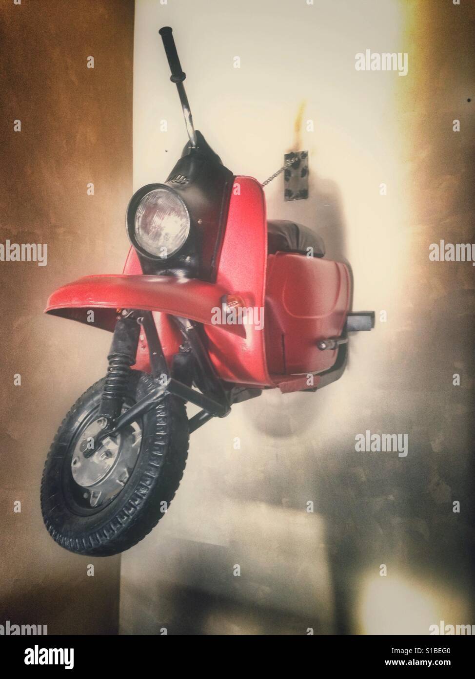Scooter in a wall, bar decoration - Smartphone Captured Stock Image