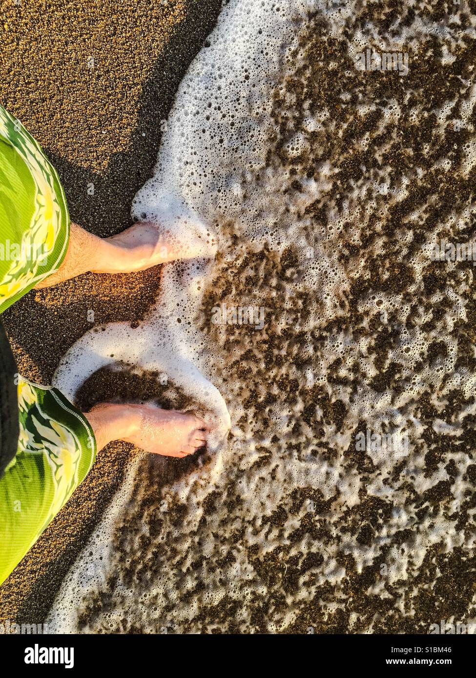 Feet at the beach point of view Stock Photo