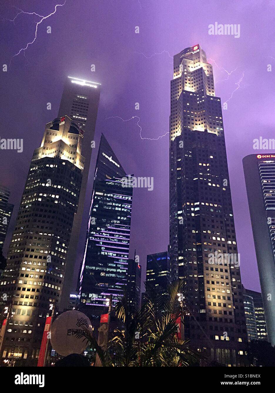 Lightning above singapore city skyline Stock Photo