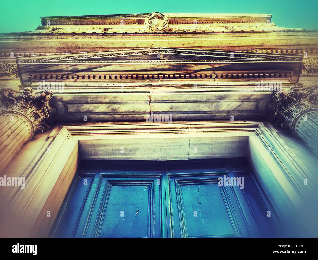 Roman Colom Roman front green door with classic architetture columns Stock Photo ...