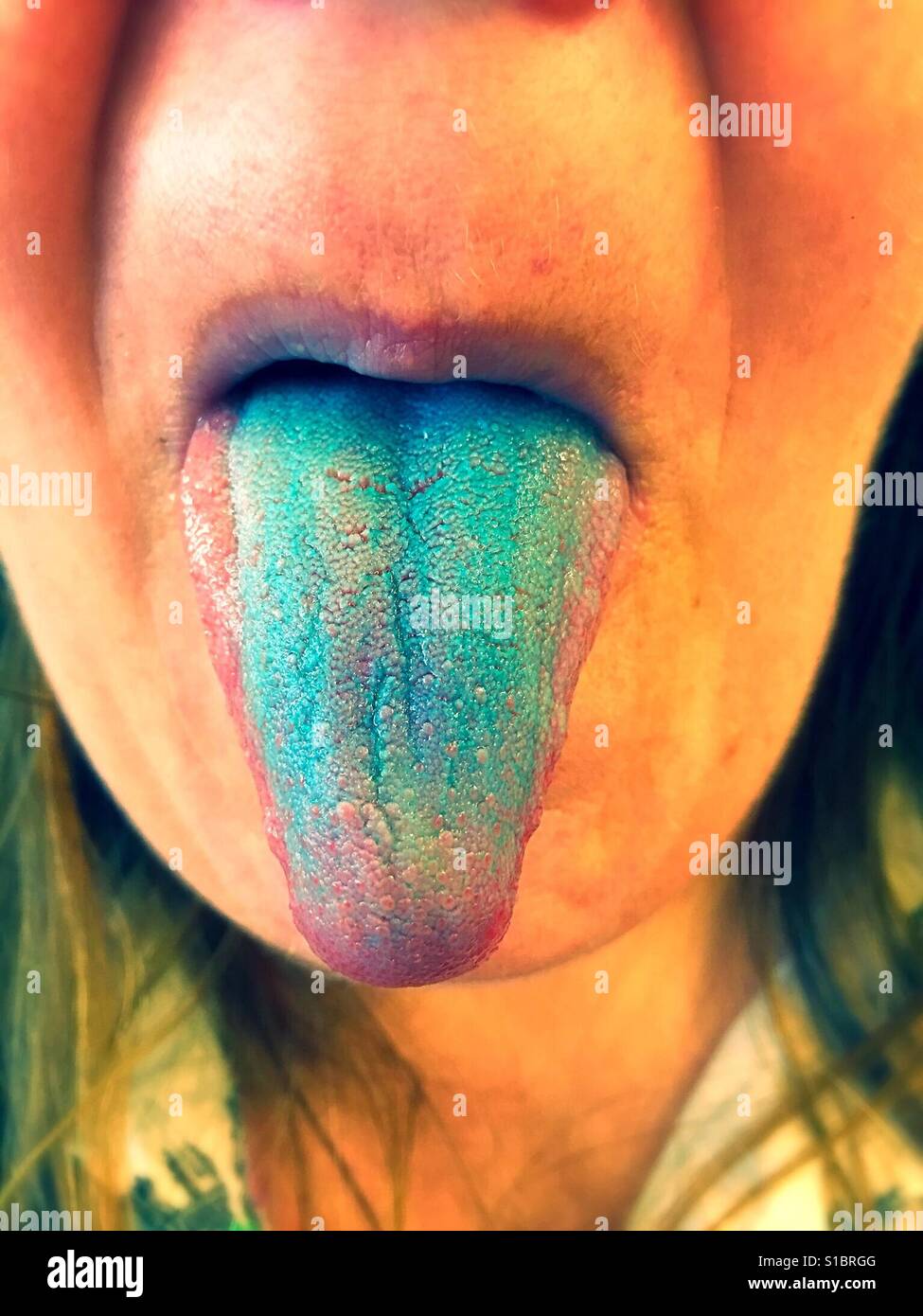 Dyed blue tongue Stock Photo Alamy