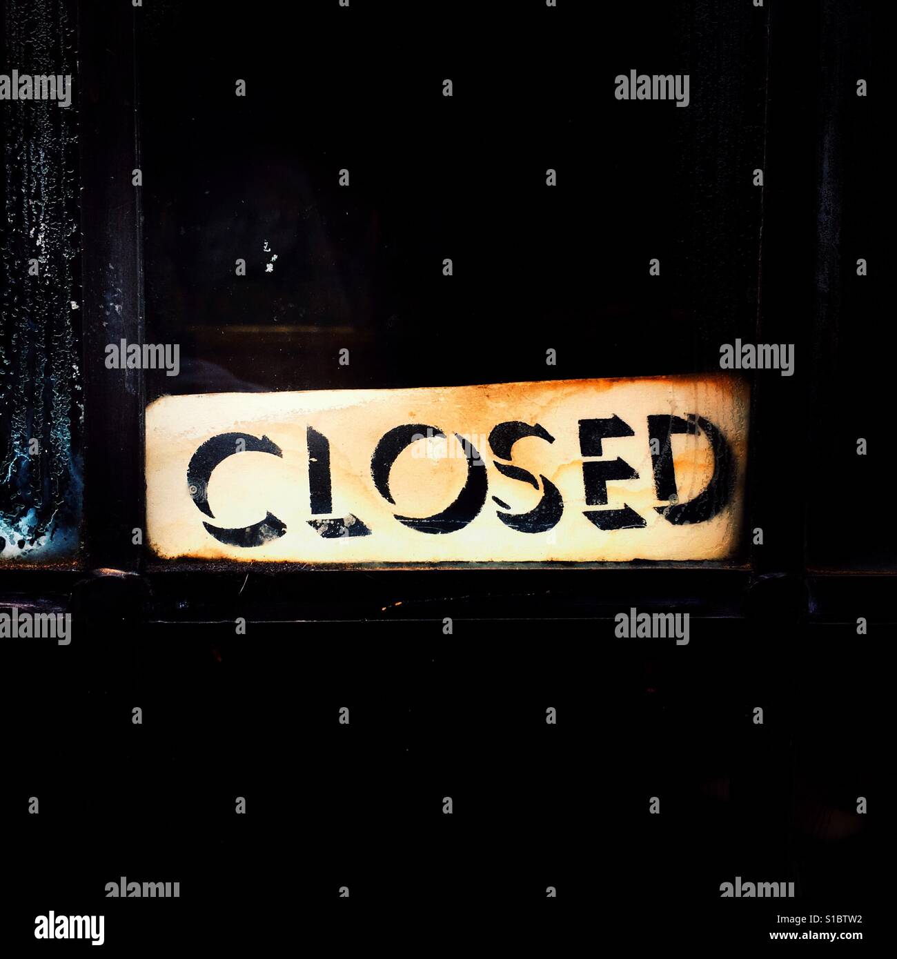 Closed sign in shop window - Smartphone Captured Stock Image