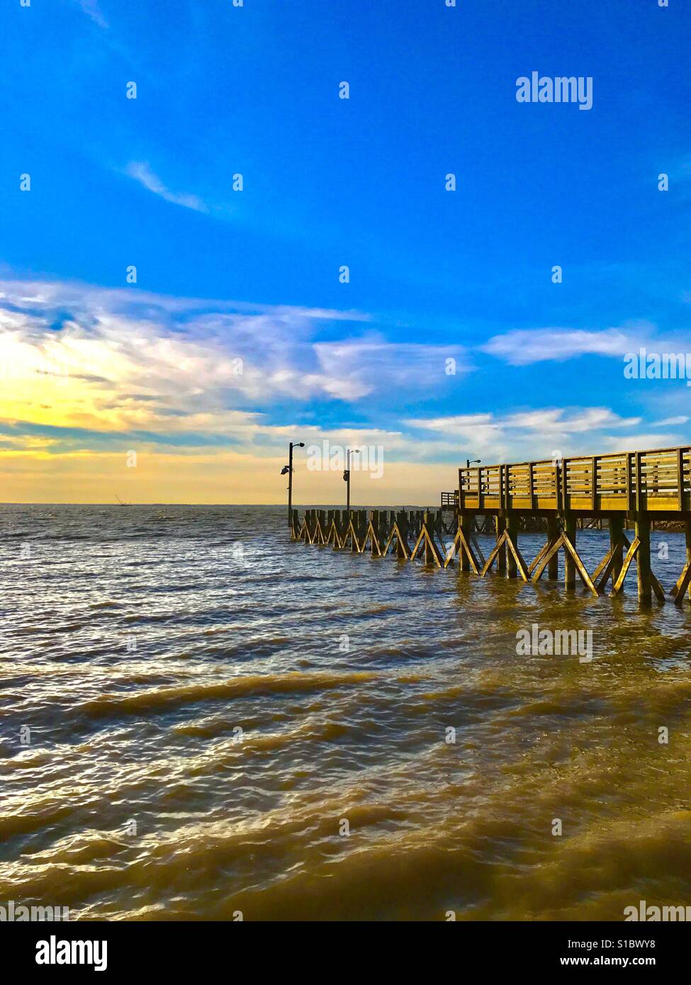 Fishing pier sunset Stock Photo Alamy