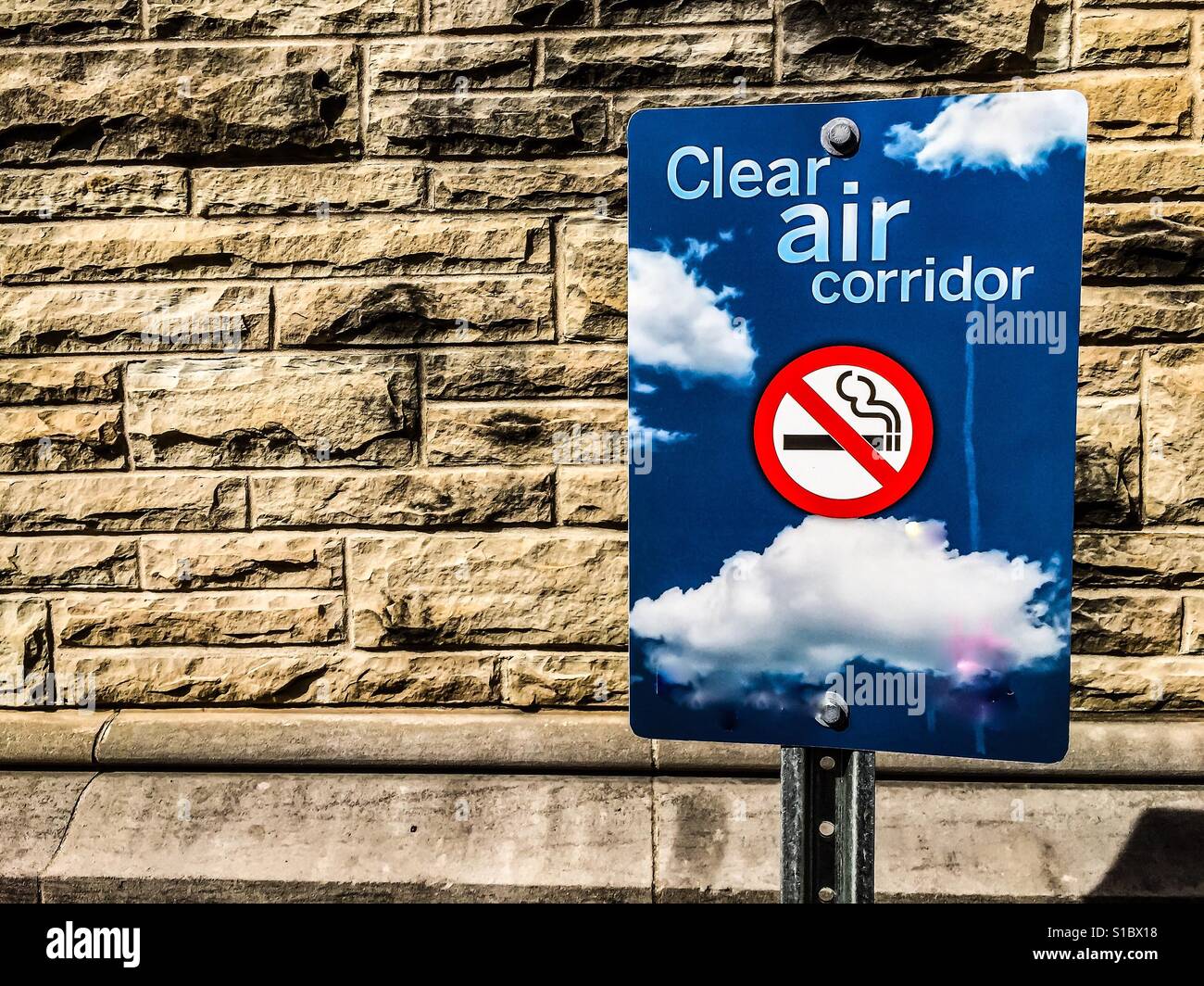 Clean air. First a corridor, then entire area declared “No Smoking Zone” or “Smoke Free.” First stage. - Smartphone Captured Stock Image