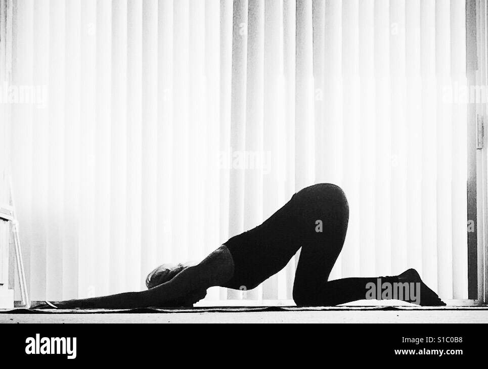 Black and White Photo of a Woman Practicing Yoga · Free Stock Photo