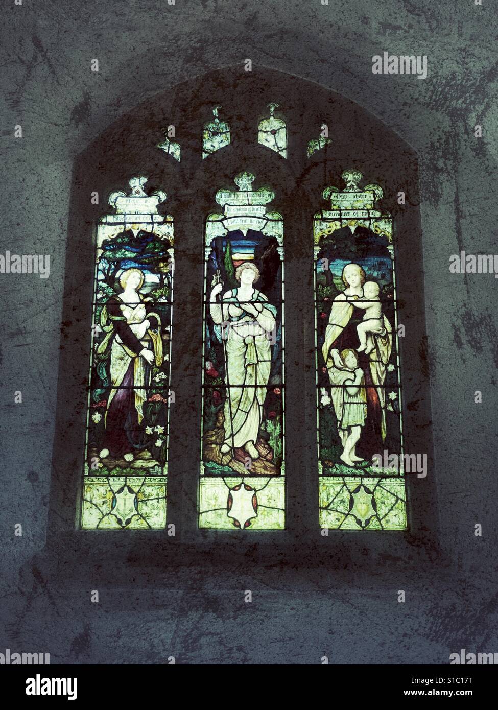 Stained glass window in the ancient St. Andrews Church, Minterne Magna, Dorset, England - Smartphone Captured Stock Image