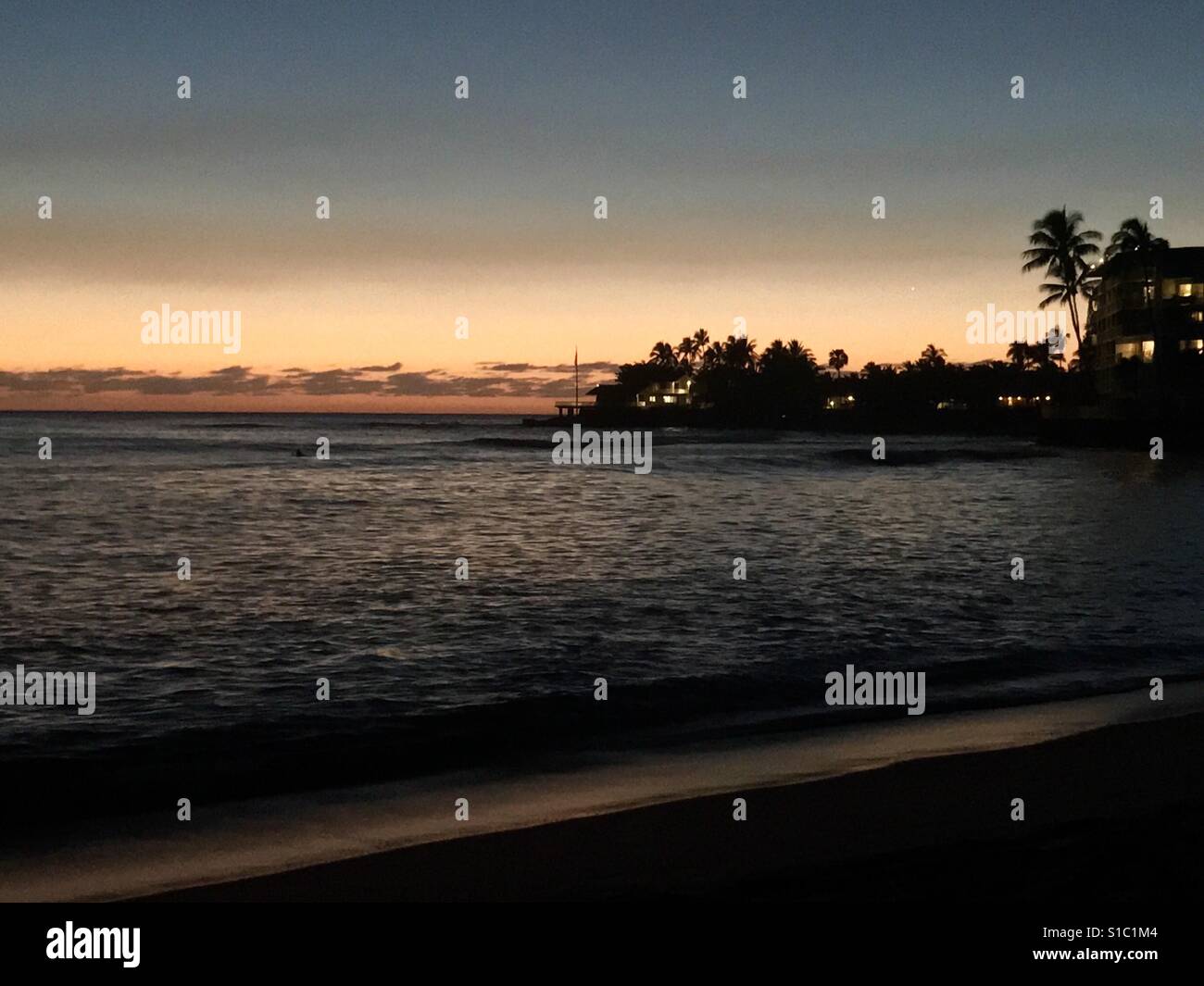 Sunset Over Makaha Beach Park in Waianae, Hawaii Stock Photo