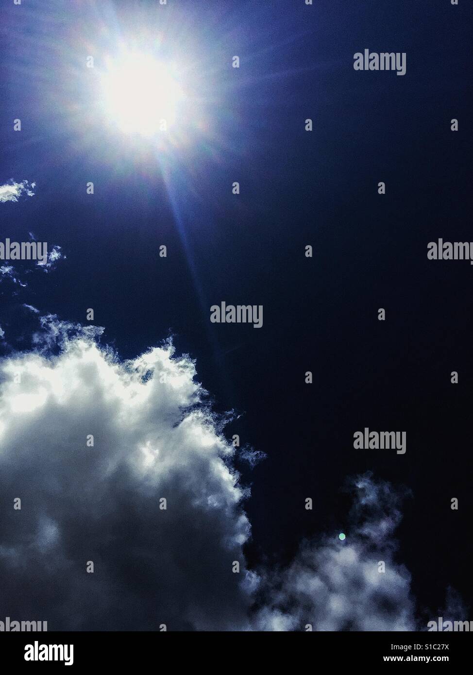 The Sun and clouds. - Smartphone Captured Stock Image