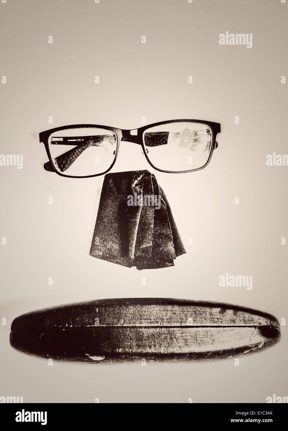 Face from spectacles, cleaning cloth and case. - Smartphone Captured Stock Image