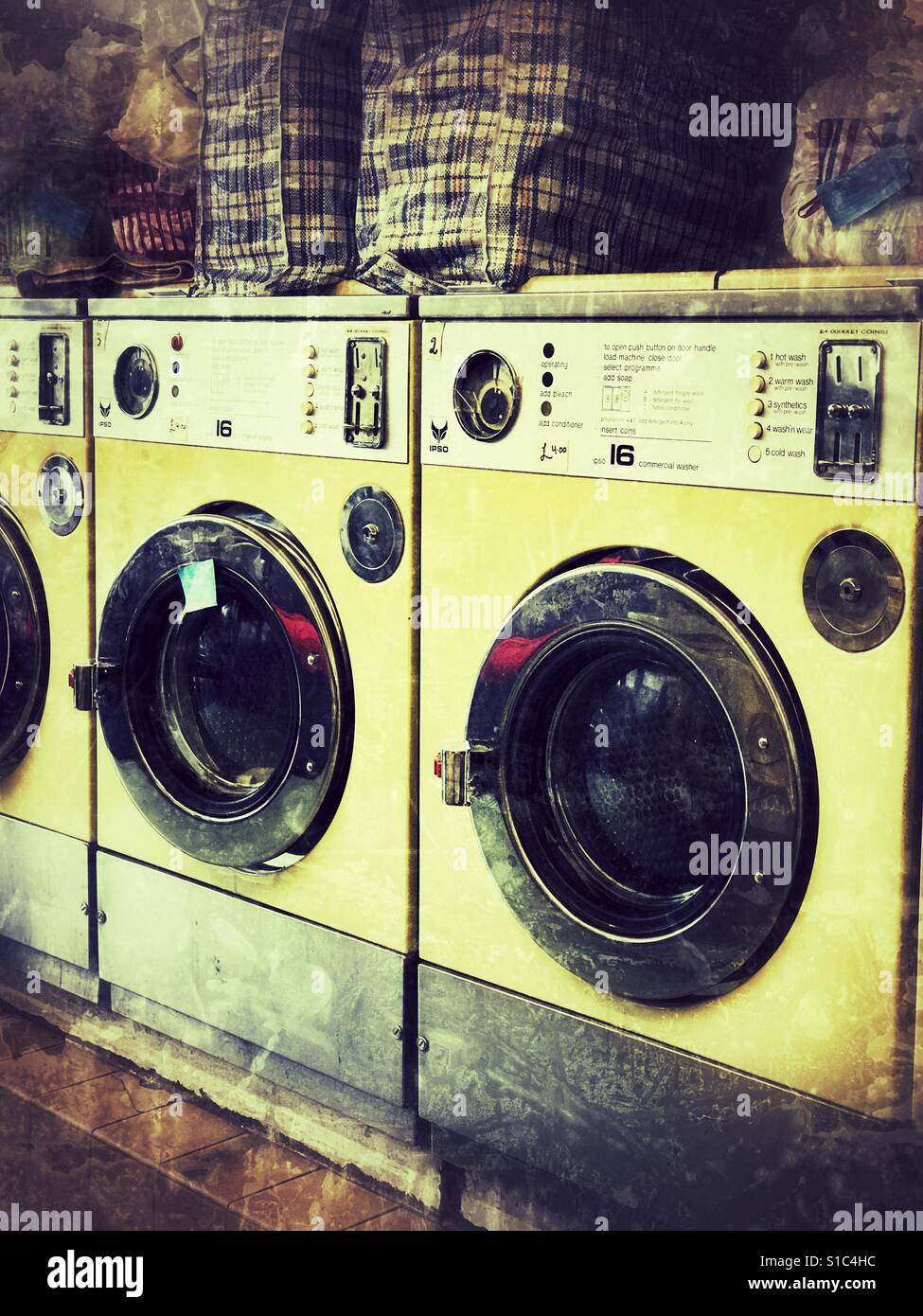 Washing machines in a launderette Stock Photo Alamy