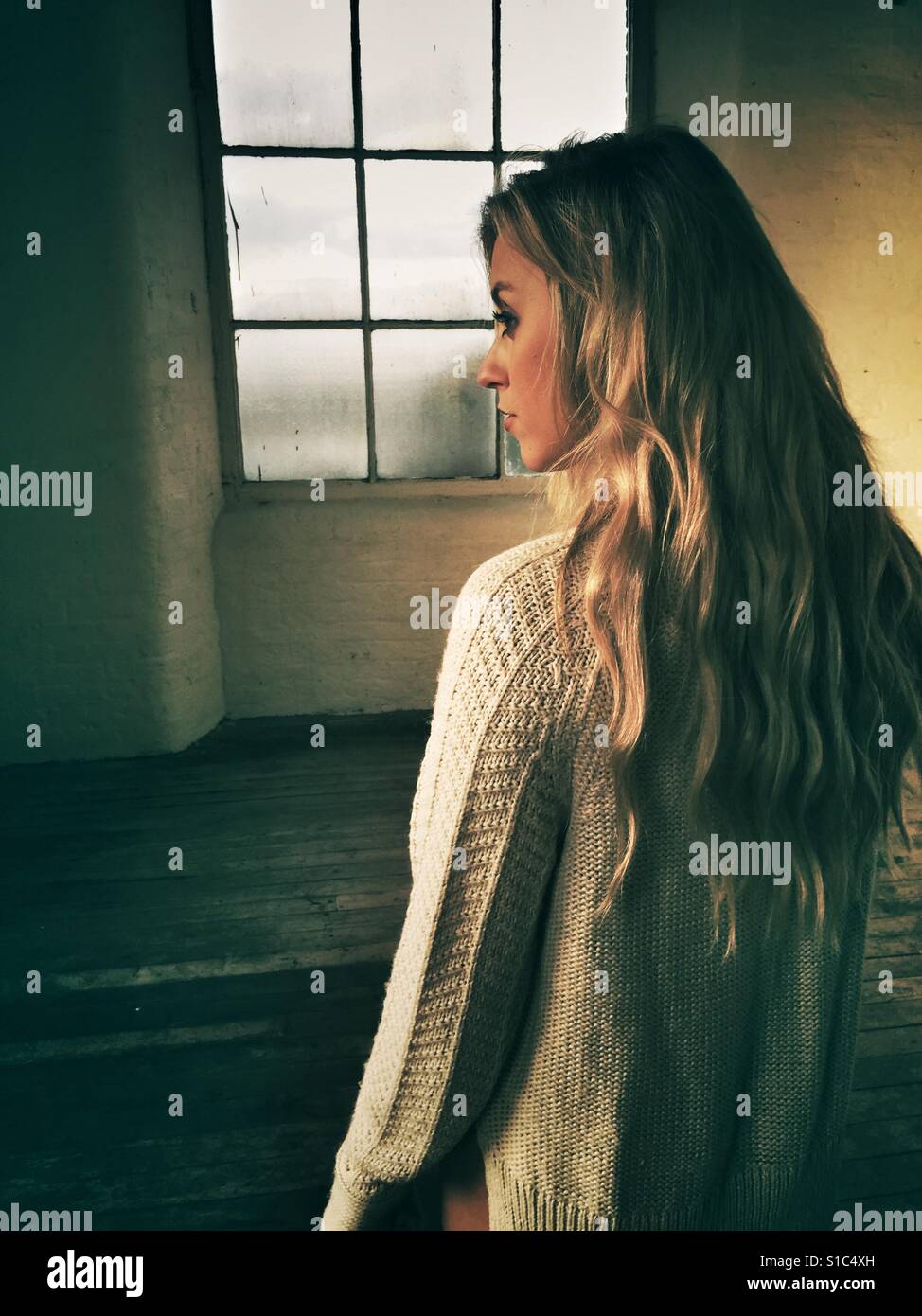 Blond woman rear view hi-res stock photography and images - Alamy