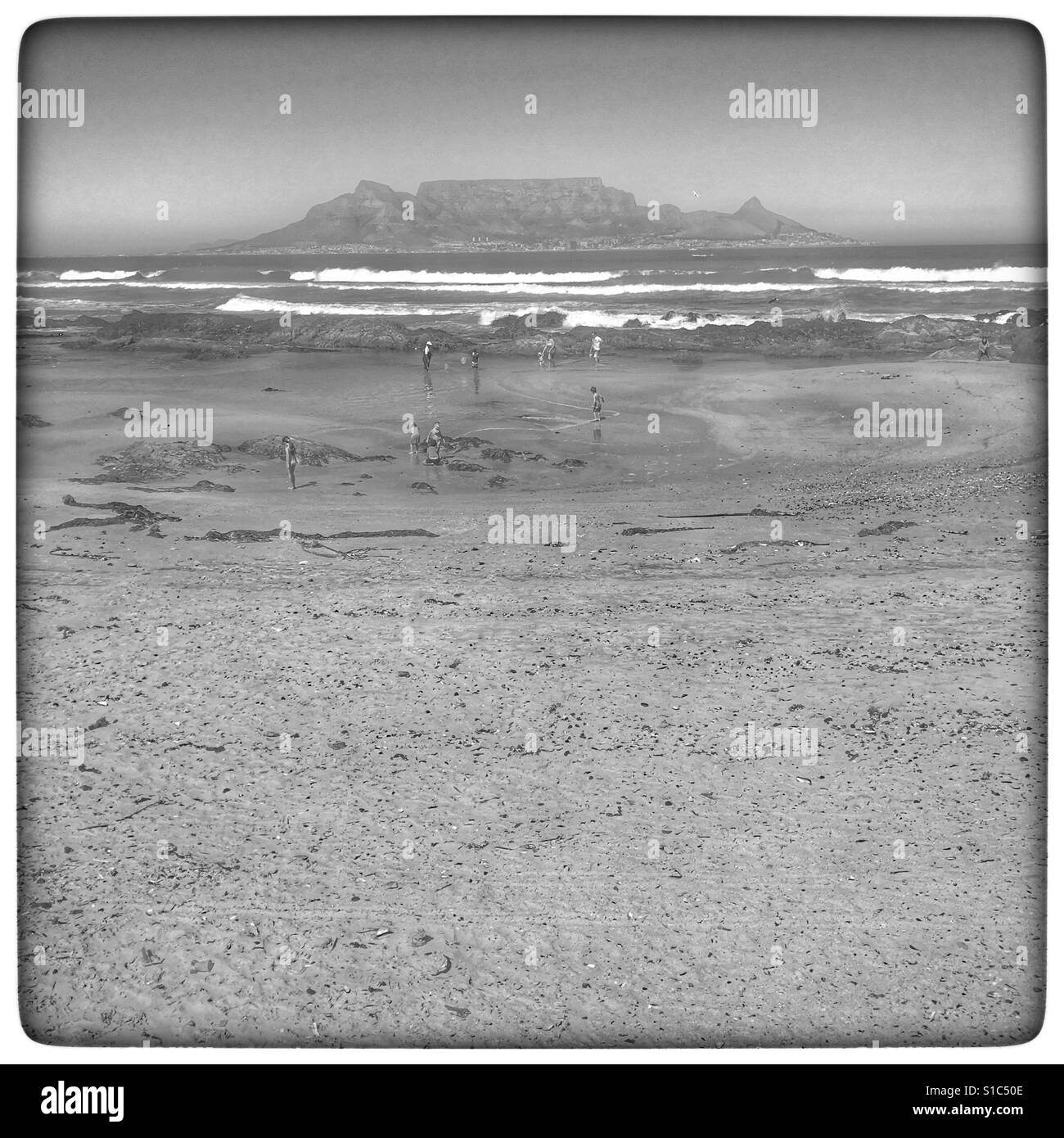 Table Mountain as seen from Bloubergstrand, Cape Town, South Africa. Black and white photo. - Smartphone Captured Stock Image