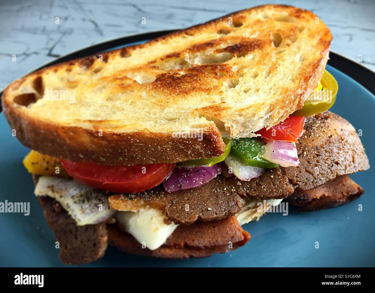 A sandwich made with vegan meat and cheese Stock Photo Alamy