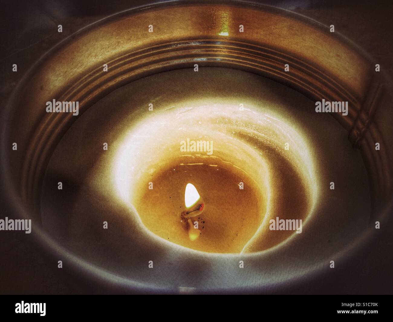 Candle in a tin - Smartphone Captured Stock Image