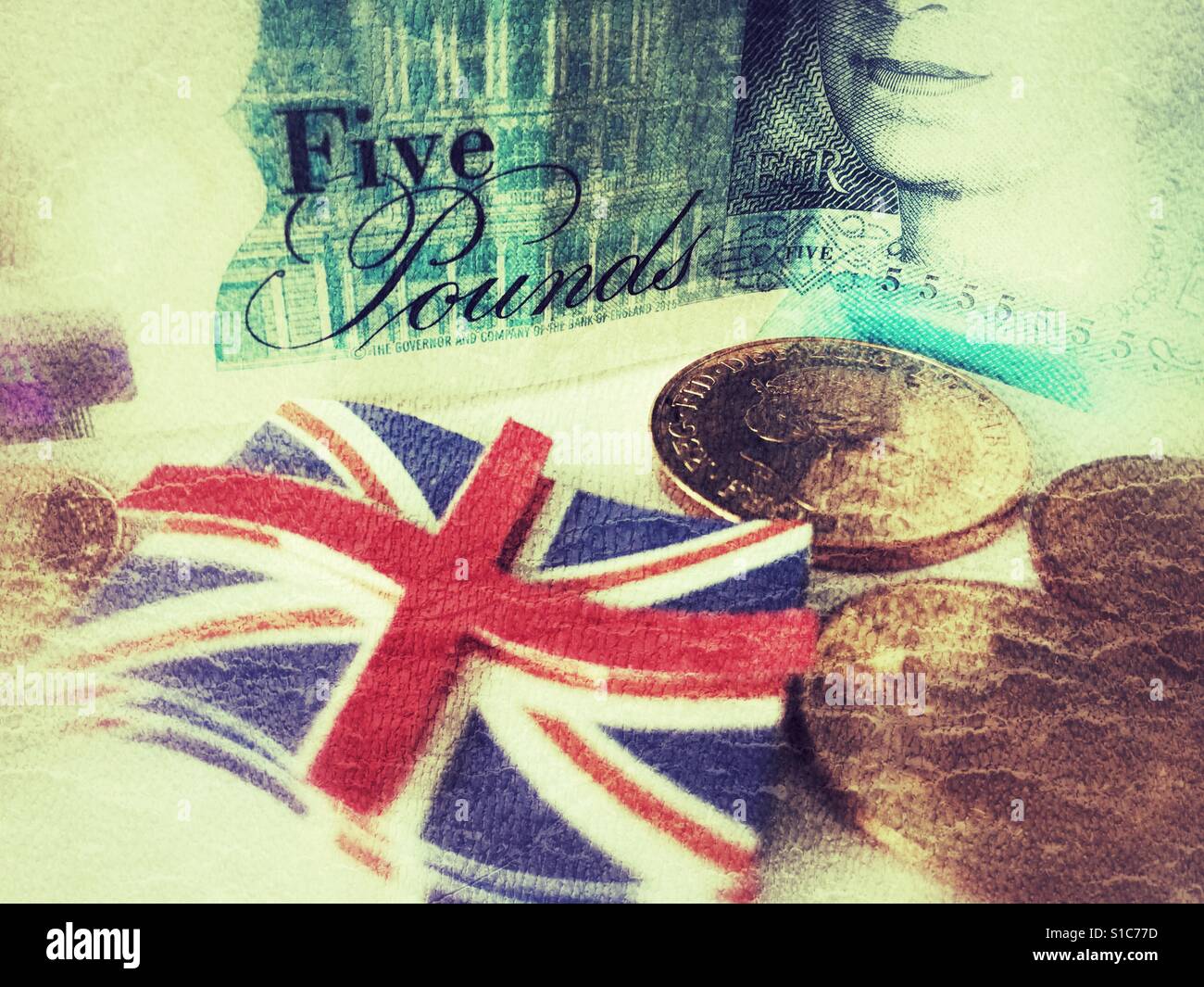 English £5 banknote, coins and a Union Jack flag. - Smartphone Captured Stock Image