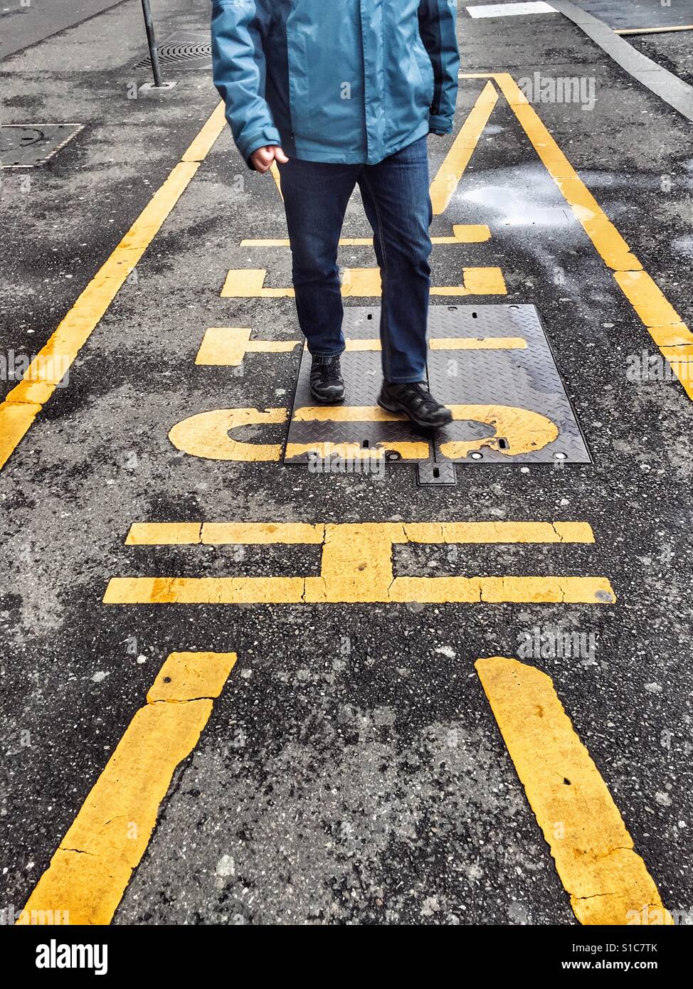 Man walking on hotel parking spot - Smartphone Captured Stock Image