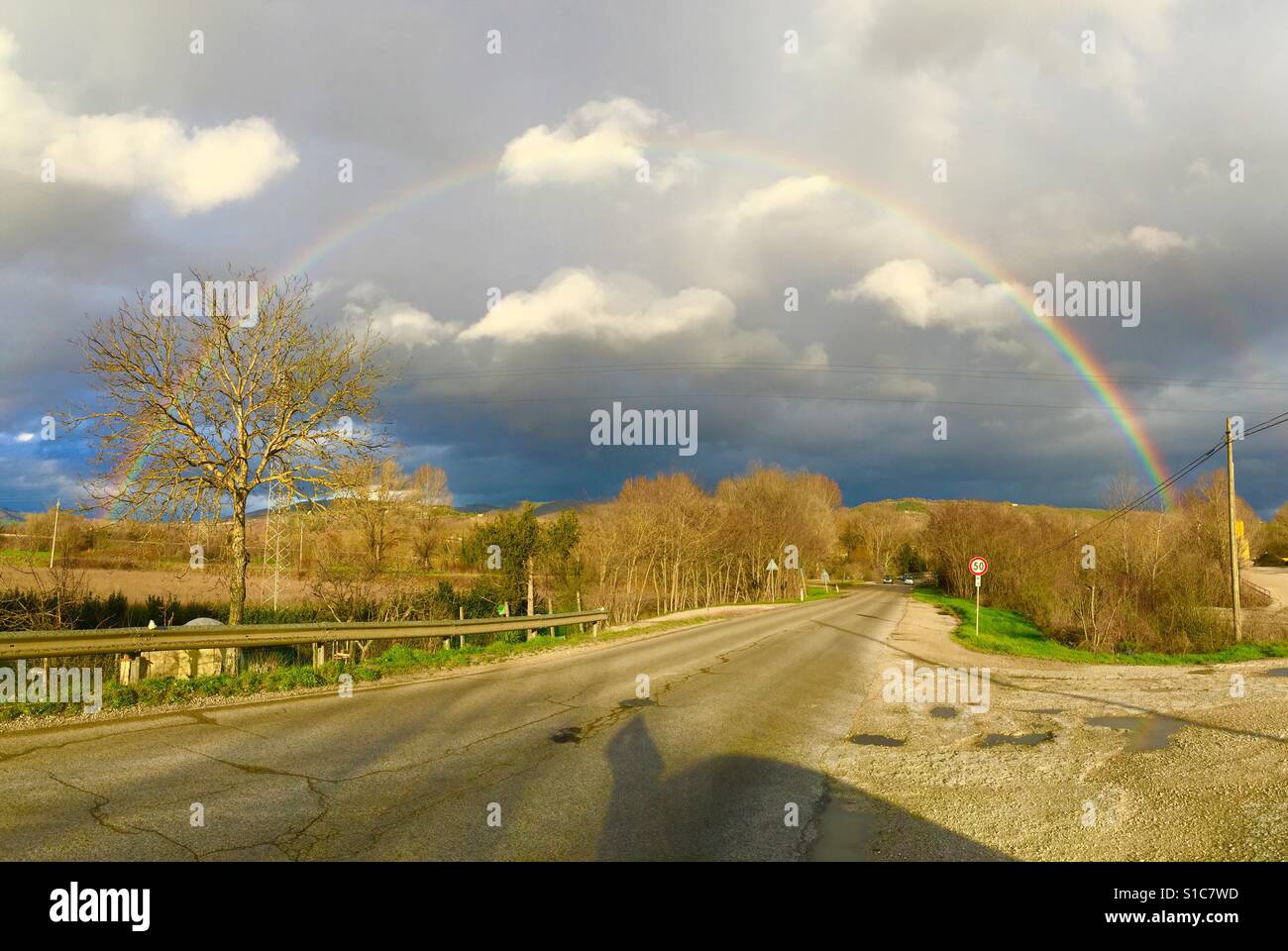 Rainbow at sunset in Umbria, Italy - Smartphone Captured Stock Image